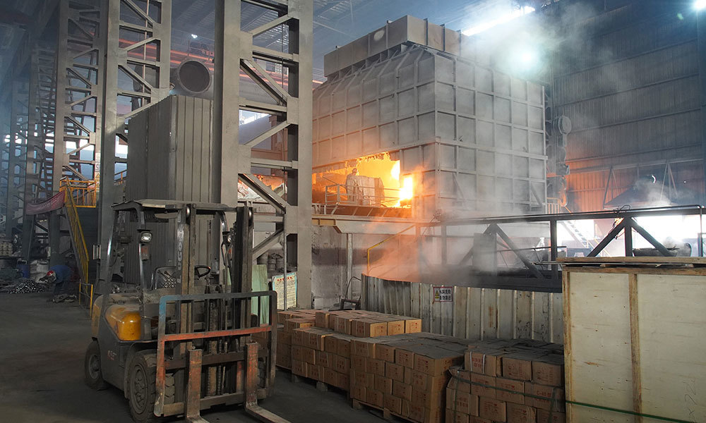 Industrial furnace for steel shot production