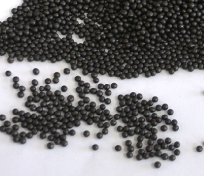 Close-up of industrial steel shot abrasive media